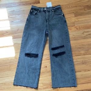 Adika Black ripped open legged jeans